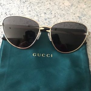Gucci cat eye aviator sunglasses.